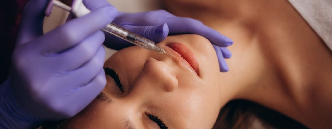 A woman consulting with an injector at a med spa in Jericho, Long Island