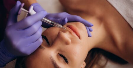 A woman consulting with an injector at a med spa in Jericho, Long Island