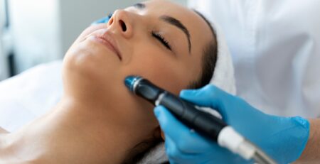 A clean, modern med spa treatment room in Jericho, Long Island, set up for a HydraFacial appointment